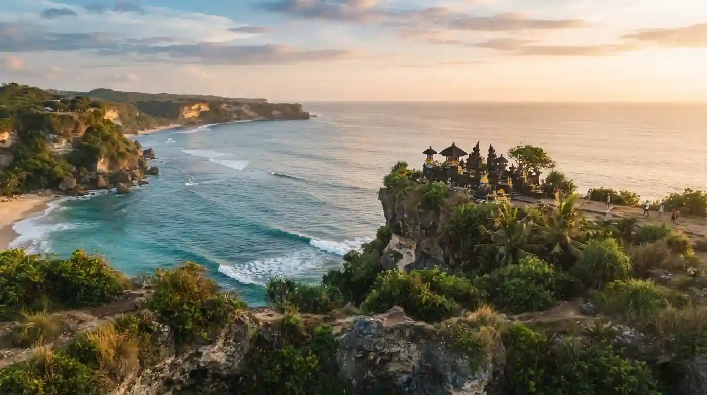 Dramatic South Bali coastline with limestone cliffs, tropical scenery, and a Balinese temple overlooking the ocean